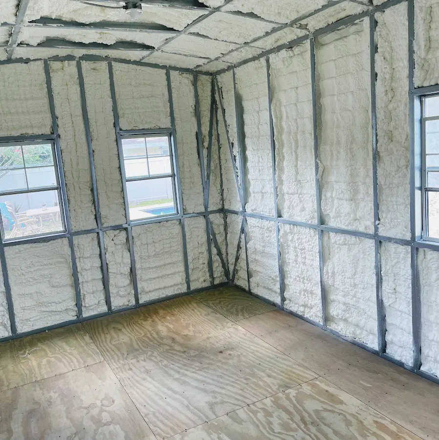 Closed-cell spray foam insulation applied to wall cavities in a residential project in Essex